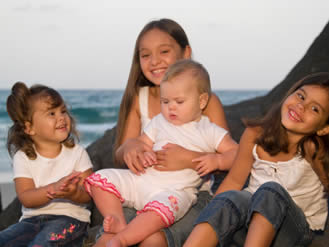 four kids a the beach